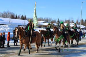 Riders with Alaska C&C Horse Adventures participate in the 30th Annual Sweeneys St. Patricks Day Parade on Wednesday, March 17 in Soldotna, Alaska. (Ashlyn OHara/Peninsula Clarion)