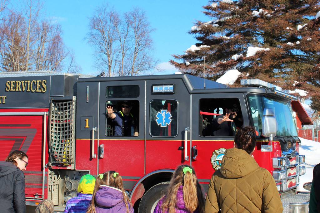 A CES fire engine drives in the 30th Annual Sweeneys St. Patricks Day Parade on Wednesday, March 17 in Soldotna, Alaska. (Ashlyn OHara/Peninsula Clarion)