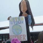 Charles Aguilar operates his puppet of Mother Earth at the start of the Womens March on Saturday, Jan. 21, 2017, in Homer, Alaska. (Photo by Michael Armstrong/Homer News)