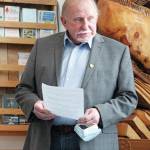 Peter Zuyus, executive director of the nonprofit Seniors of Alaska, speaks at a recognition and award ceremony for local senior advocate Nona Safra on Wednesday, March 10, 2021 at the Homer Chamber of Commerce & Visitor Center in Homer, Alaska. (Photo by Megan Pacer/Homer News)