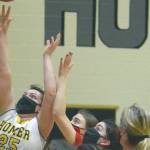 Homer's Tonda Smude scores against Kenai Central on Friday, March 12, 2021, at the Southcentral Conference tournament at Nikiski High School in Nikiski, Alaska. (Photo by Jeff Helminiak/Peninsula Clarion)