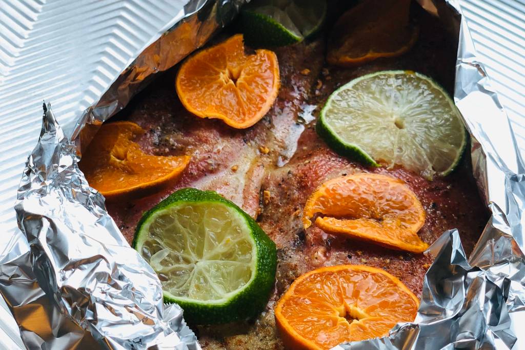 Fresh citrus and pantry staples like taco seasoning and granulated garlic make for an easy and delicious baked salmon thats ready to be enjoyed inside a taco, photographed on March 23, 2021 in Anchorage, Alaska. (Photo by Victoria Petersen/Peninsula Clarion)
