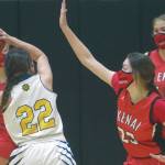 Homer's Hannah Hatfield is defended by Kenai Central's Logan Satathite on Friday, March 12, 2021, at the Southcentral Conference tournament at Nikiski High School in Nikiski, Alaska. (Photo by Jeff Helminiak)