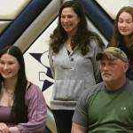 Soldotna senior Autumn Fischer signs her National Letter of Intent on Friday, March 26, 2021, at Soldotna High School in Soldotna, Alaska. Next to Autumn is her father, Eric Fischer. In the back row is mother, Judith Fischer, and sister, Brook Fischer. (Photo provided)
