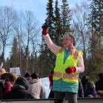 Carol Bannock directs families to an Easter egg hunt at Kenai Municipal Park on Friday, April 2, 2021 in Kenai, Alaska. (Ashlyn OHara/Peninsula Clarion)