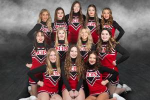 The Kenai Central high school cheerleading team. Back row, left to right: Karley Harden, Nia Calvert, Katie Stockton, Rileigh Pace and Kyrie Medina. Middle row: Karah Huff, Melena Grieme, Calani Holmes and Maya Montague. Front row: Emmalee Roney, Kaitlyn Taylor and Kori Moore. (Photo courtesy of Rebecca Beddow of BeKaptured Photography)