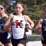 Kenai Centrals Emilee Wilson leads Soldotnas Erika Arthur and Jordan Strausbaugh during the 800-meter run during a dual meet Friday, April 16, 2021, at Kenai Central High School in Kenai, Alaska. (Photo by Jeff Helminiak/Peninsula Clarion)