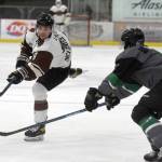 Kenai River Brown Bears forward Brandon Lajoie, of Eagle River, shoots against the Chippewa (Wisconsin) Steel on Sunday, April 25, 2021, at the Soldotna Regional Sports Complex in Soldotna, Alaska. (Photo by Jeff Helminiak/Peninsula Clarion)