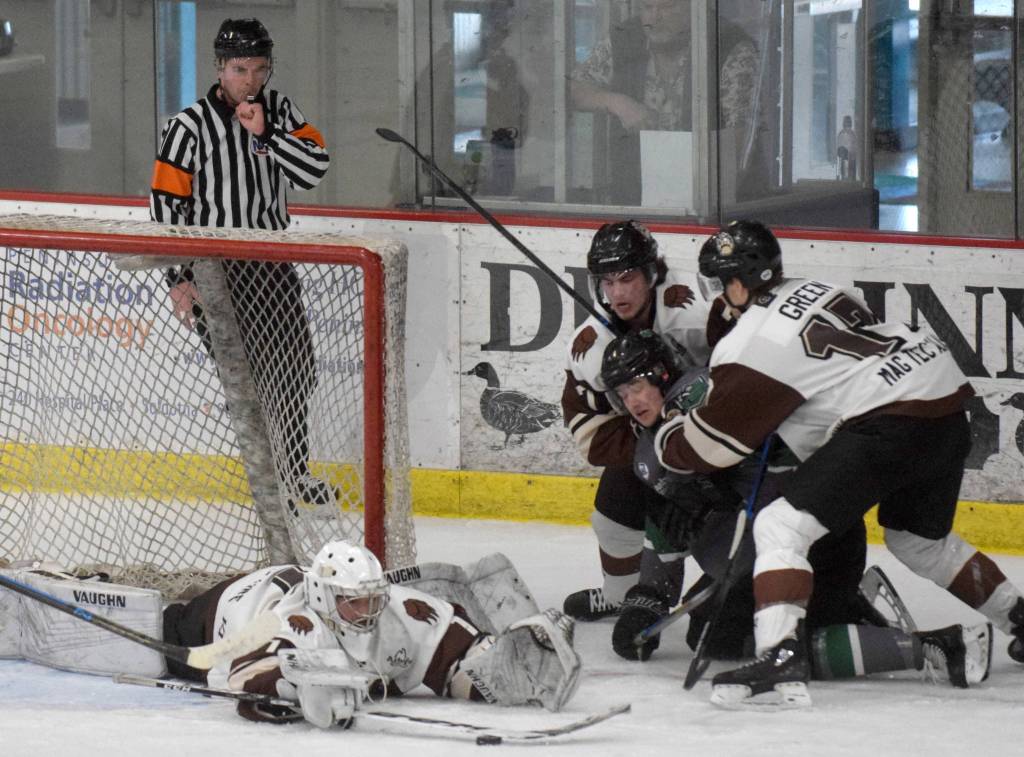 Kenai River Brown Bears goaltender Luke Pavicich makes a save against the Chippewa (Wisconsin) Steel on Sunday, April 25, 2021, at the Soldotna Regional Sports Complex in Soldotna, Alaska. (Photo by Jeff Helminiak/Peninsula Clarion)