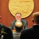 Peter Segall / The Juneau Empire 
Senate President Peter Micciche, R-Soldotna, has his picture taken by a fellow senator after being unanimously elected on the first day of the 32nd Alaska Legislature on Jan. 19 in Juneau.