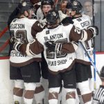 The Kenai River Brown Bears celebrate the first-period goal of Shayne Tomlinson (second from left) Friday, April 30, 2021 at the Soldotna Regional Sports Complex in Soldotna, Alaska. (Photo by Jeff Helminiak/Peninsula Clarion)