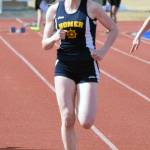 Homers Laura Inama runs to victory in the 100 meters at the SoHi Invitational on Saturday, May 1, 2021, at Soldotna High School in Soldotna, Alaska. (Photo by Jeff Helminiak/Peninsula Clarion)