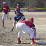 Kenai Central third baseman Charlie Chamberlain gets ready to tag out Soldotnas Dylan Davidhizar on Tuesday, May 4, 2021, at the Soldotna Little League fields in Soldotna, Alaska. (Photo by Jeff Helminiak/Peninsula Clarion)