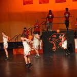 The cast of Nikiski Middle/High Schools spring production of High School Musical sing onstage as their characters in Nikiski, Alaska, on Wednesday May 5, 2021. (Camille Botello / Peninsula Clarion)
