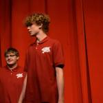 Foreground: Brady Bostic sings onstage as his character Chad Danforth in the Nikiski Middle/High Schools spring production of High School Musical in Nikiski, Alaska, on Wednesday May 5, 2021. (Camille Botello / Peninsula Clarion)