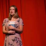 Camry Ellis sings onstage as her character Gabriella Montez in the Nikiski Middle/High Schools spring production of High School Musical in Nikiski, Alaska, on Wednesday May 5, 2021. (Camille Botello / Peninsula Clarion)
