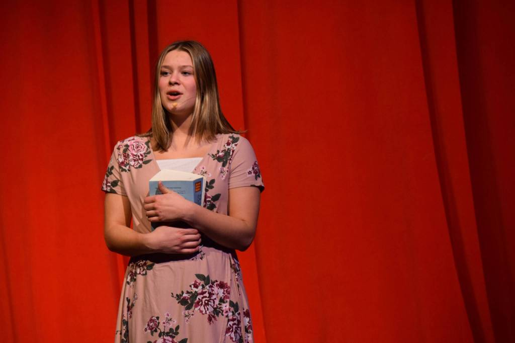 Camry Ellis sings onstage as her character Gabriella Montez in the Nikiski Middle/High Schools spring production of High School Musical in Nikiski, Alaska, on Wednesday May 5, 2021. (Camille Botello / Peninsula Clarion)