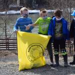 From left to right: Soldotna Montessori elementary schoolers Augie Mohr, Nathan Nelson, Kian Jester and Corbin Sulley participate in the annual Kenai River Spring Cleanup at Soldotna Creek Park in Soldotna, Alaska, on Friday, May 7, 2021. (Camille Botello / Peninsula Clarion)
From left to right: Soldotna Montessori elementary schoolers Augie Mohr, Nathan Nelson, Kian Jester and Corbin Sulley participate in the annual Kenai River Spring Cleanup at Soldotna Creek Park in Soldotna, Alaska, on Friday, May 7, 2021. (Camille Botello / Peninsula Clarion)