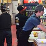 Employees work the lunch rush at Jersey Subs in Kenai, Alaska on Thursday, May 13, 2021. The sandwich shop is having trouble finding people to work this summer. (Camille Botello / Peninsula Clarion)