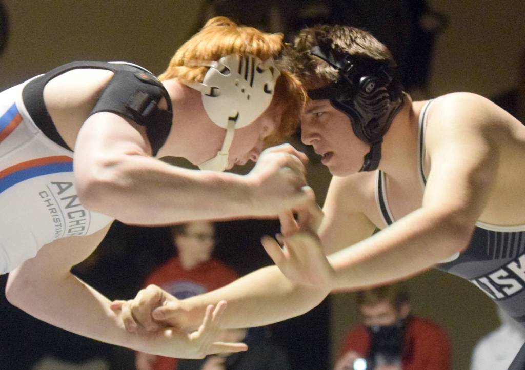 Ryan Randall of Anchorage Christian Schools defeats Nikiskis Tim Goodnight for the Kachemak Conference wrestling crown at 215 pounds Saturday, May 15, 2021, at Nikiski High School in Nikiski, Alaska. (Photo by Jeff Helminiak/Peninsula Clarion)