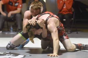 Boston Postishek of Redington defeats Kenai Central's Andrew Gaethle for the Kachemak Conference wrestling title at 145 pounds Saturday, May 15, 2021, at Nikiski High School in Nikiski, Alaska. (Photo by Jeff Helminiak/Peninsula Clarion)