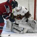 Laker Aldridge of the Fairbanks Ice Dogs tries to solve Kenai River Brown Bears goalie Luke Pavicich on Friday, May 14, 2021, at the Soldotna Regional Sports Complex in Soldotna, Alaska. (Photo by Jeff Helminiak/Peninsula Clarion)