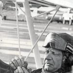Ruralite photo courtesy of the Isaak family
Dr. Paul Isaak excelled as a pilot as well as a physician. Here he prepares to take off in his open-cockpit airplane that he used for stunt-flying, particularly at the annual Fly-In Breakfast in Soldotna.