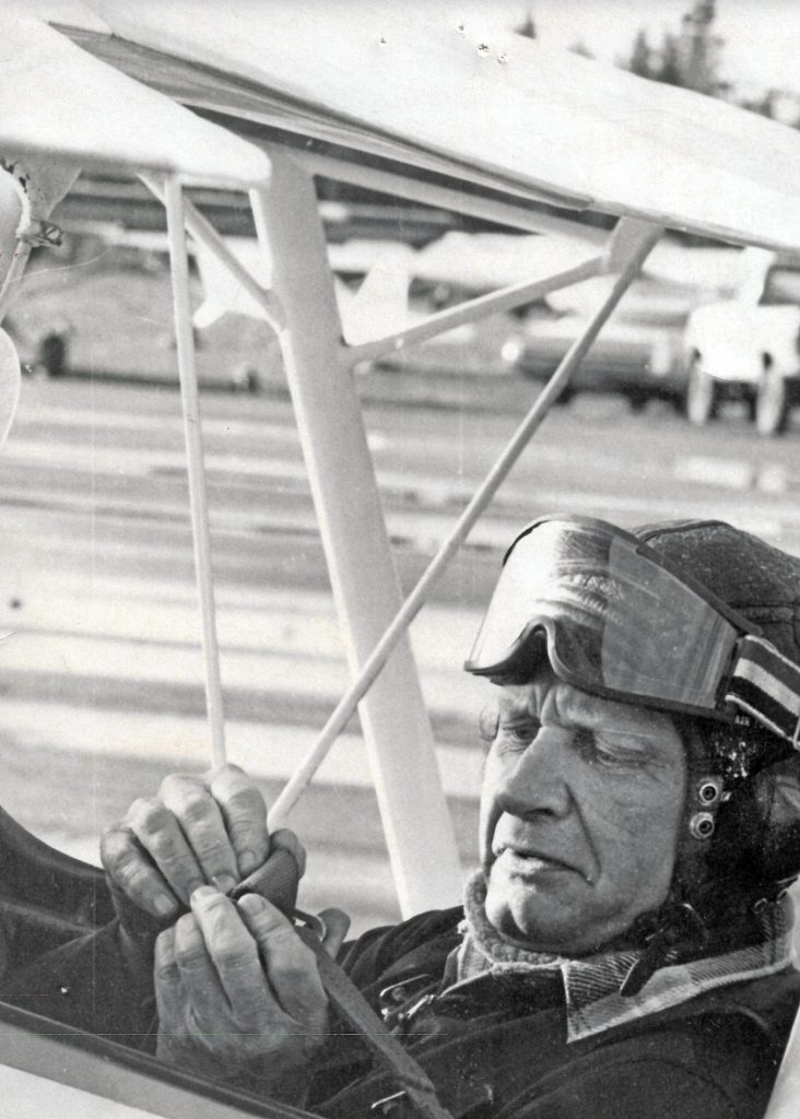 Ruralite photo courtesy of the Isaak family
Dr. Paul Isaak excelled as a pilot as well as a physician. Here he prepares to take off in his open-cockpit airplane that he used for stunt-flying, particularly at the annual Fly-In Breakfast in Soldotna.