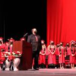 Kenai Central High School Assistant Principal Will Chervenak joins students on stage during graduation on Monday, May 17, 2021 in Kenai, Alaska. (Ashlyn OHara/Peninsula Clarion)