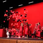 Balloons are dropped from the ceiling of Renee C. Henderson Auditorium during Kenai Central High Schools graduation ceremony on Monday, May 17, 2021 in Kenai, Alaska. (Ashlyn OHara/Peninsula Clarion)
