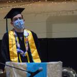 Parker Kincaid, valedictorian of the River City Academy class of 2020, speaks at the 2021 commencement ceremony in Soldotna, Alaska on Monday, May 17, 2021. The class of 2020 was invited to attend because their graduation was canceled last year due to the COVID-19 pandemic. (Camille Botello / Peninsula Clarion)