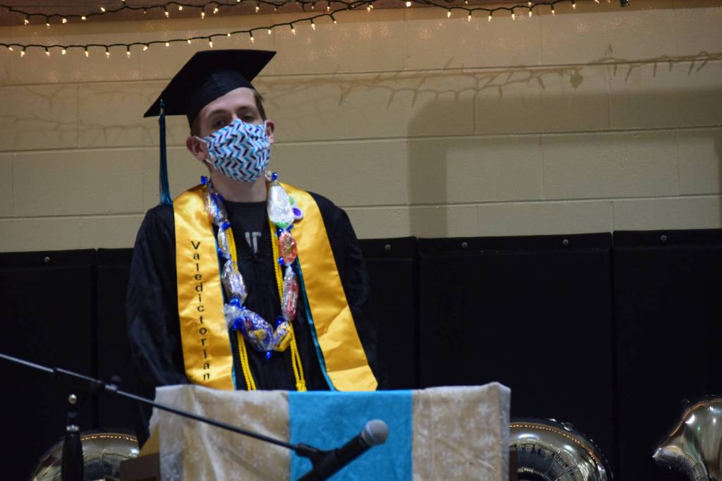 Parker Kincaid, valedictorian of the River City Academy class of 2020, speaks at the 2021 commencement ceremony in Soldotna, Alaska on Monday, May 17, 2021. The class of 2020 was invited to attend because their graduation was canceled last year due to the COVID-19 pandemic. (Camille Botello / Peninsula Clarion)