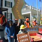Supporters of the trail-building conservation corps started with CARES Act funding rallied in front of the Governor's Mansion on Tuesday, May 18, 2021, to urge state officials to continue funding the programs. (Peter Segall / Juneau Empire)