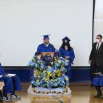 Jullian Miller (left) and Alivia Howard speak during Kenai Alternative High Schools 2021 graduation ceremony on Tuesday, May 18, 2021 in Kenai, Alaska. (Ashlyn OHara/Peninsula Clarion)