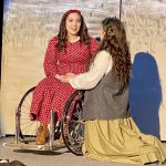 Jayni Parish (left) and Brittany Gilman act onstage as their characters Beth and Jo March in the Kenai Performers production of Little Women, which premieres on Thursday, May 20, 2021. (Photo provided)