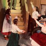 From left: Jayni Parish, Alyeska Krull, Selia Butler, Brittany Gilman and Braeden Garrett (center) act onstage as their characters the March sisters and Theodore Laurie Lawrence in the Kenai Performers production of Little Women, which headlines on Thursday, May 20, 2021. (Photo provided)