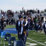 Soldotna High School students celebrate their graduation on Tuesday, May 18, 2021 at the high school football field. (Camille Botello / Peninsula Clarion)