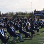 Soldotna High School students celebrate their graduation on Tuesday, May 18, 2021 at the high school football field. (Camille Botello / Peninsula Clarion)