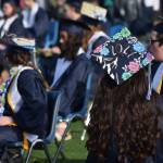 Soldotna High School students celebrate their graduation on Tuesday, May 18, 2021 at the high school football field. (Camille Botello / Peninsula Clarion)
