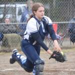 Soldotna catcher Bailey Conner stretches for a pop fly Thrusday, May 20, 2021, against Homer in Soldotna, Alaska. The ball popped out of the glove and was ruled a foul ball. (Photo by Jeff Helminiak/Peninsula Clarion)