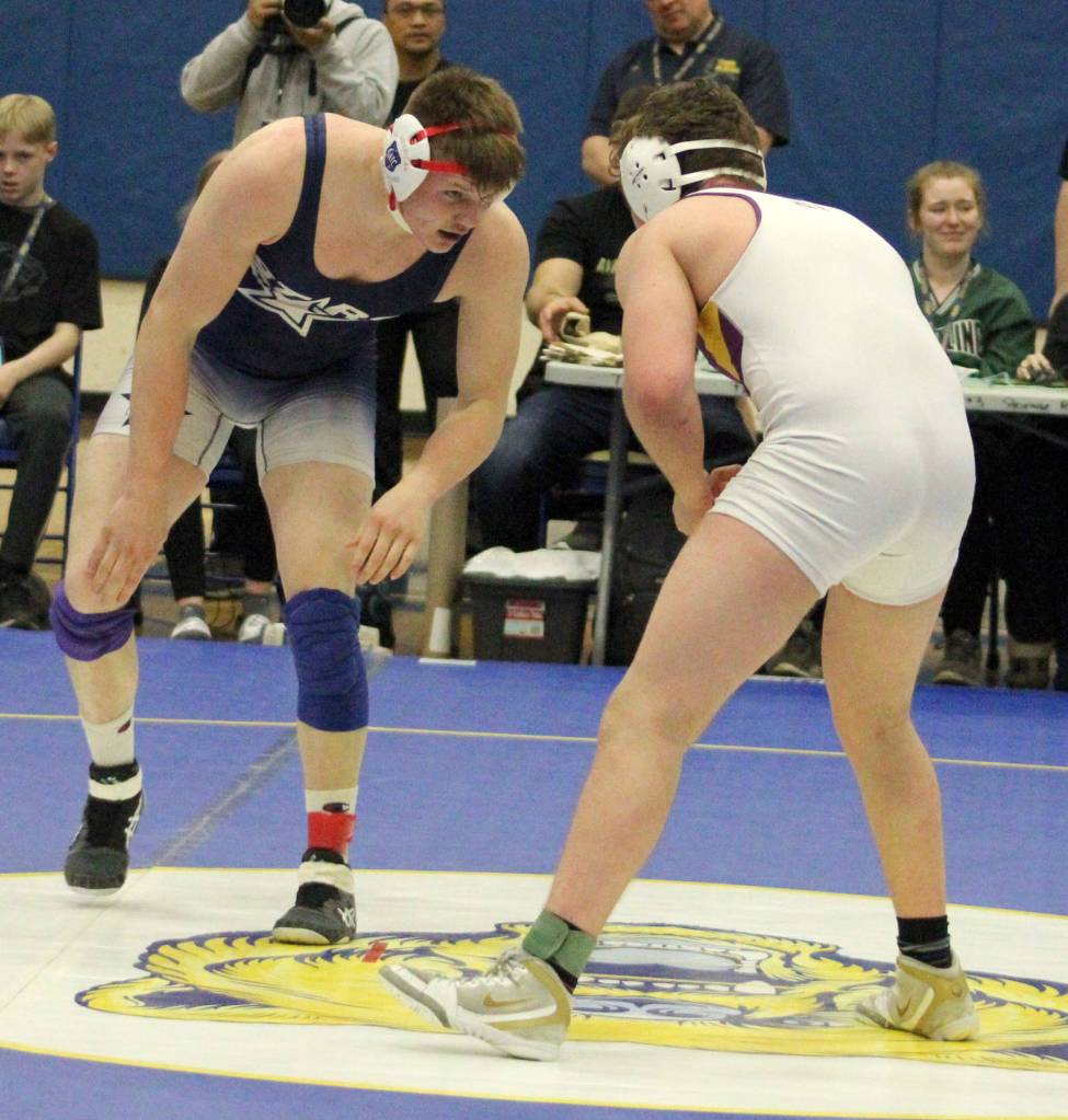Soldotnas Liam Babitt wrestles to a state title at 215 pounds against Lathrops Sean Michel on Saturday, May 22, 2021, at Bartlett High School in Anchorage, Alaska. (Photo by Jeff Helminiak/Peninsula Clarion)