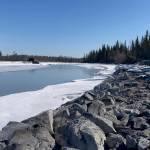 In this April 22, 2021, photo, signs of spring thaw appear along the Tazlina River in Tazlina, Alaska. The Catholic Church wants to sell 462 acres that once housed the Copper Valley mission school to the Native Village of Tazlina, a federally recognized tribe. The tribe is scrambling to raise the nearly $1.9 million asking price so it can regain stewardship of its ancestral land. (John Tierney/Indian Country Today)