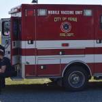 The Kenai Fire Department offers the Pfizer-BioNTech and Johnson & Johnson/Janssen COVID-19 vaccines at its mobile clinic during the first day of the Wednesday Market in Soldotna, Alaska, on Wednesday, May 26, 2021. (Camille Botello / Peninsula Clarion)