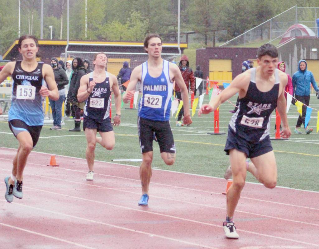 Soldotnas Nathanael Johnson leans to win the 400 meters at the Division I state track and field meet at Dimond High School in Anchorage, Alaska, on Saturday, May 29, 2021. (Photo by Tim Rockey/Frontiersman)