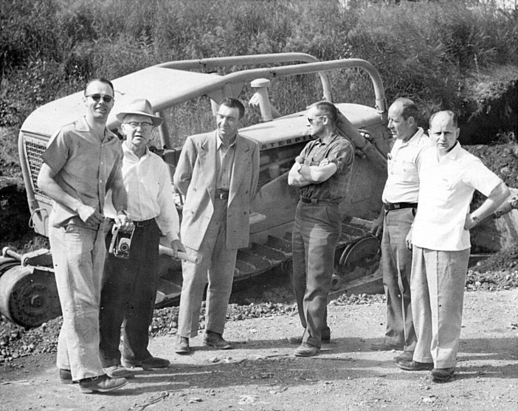 Cheechako News file photo from KPCs Kenai Peninsula Historical Photo Repository
Posing in front of a D8 Caterpillar at the March 1966 groundbreaking for the new hospital are (L-R) grocer Bob Wilson, entrepreneur Clarence Goodrich, grocer Doyle Jowers, entrepreneur Burton Carver, homesteader Jack Farnsworth and Dr. Paul Isaak.