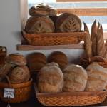 Freshly baked loaves are ready for resale at Lucys Market in Soldotna, Alaska, on Wednesday, May 26, 2021. (Camille Botello/Peninsula Clarion)