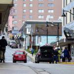 Peter Segall / Juneau Empire
Visitors depart from the Baranoff Hotel in downtown Juneau on Thursday, June 3, 2021, just days after the typically year-round hotel reopened its doors after closing for the COVID-19 pandemic. Travelers are returning, hoteliers say, but many of their rooms remain empty.