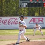 Oilers starting pitcher Liam Rocha delivers the first pitch of the season to the Alaska Goldpanners of Fairbanks on Saturday, June 5, 2021, at Coral Seymour Memorial Park in Kenai, Alaska. (Photo by Jeff Helminiak/Peninsula Clarion)
