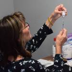 Nurse Tracy Silta draws a dose of the Moderna COVID-19 vaccine at the walk-in clinic at the strip mall at the intersection of the Kenai Spur and Sterling Highways in Soldotna, Alaska on Wednesday, June 9, 2021. (Camille Botello/Peninsula Clarion)
