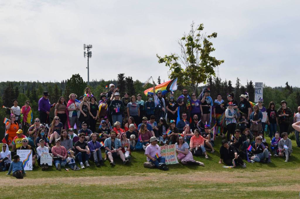 Participants in the Soldotna Pride March pose for a photograph in Soldotna Creek Park on Saturday, June 13, 2021 in Soldotna, Alaska. A group spanning the length of five blocks marched through downtown Soldotna to celebrate Pride Month. (Camille Botello/Peninsula Clarion)
